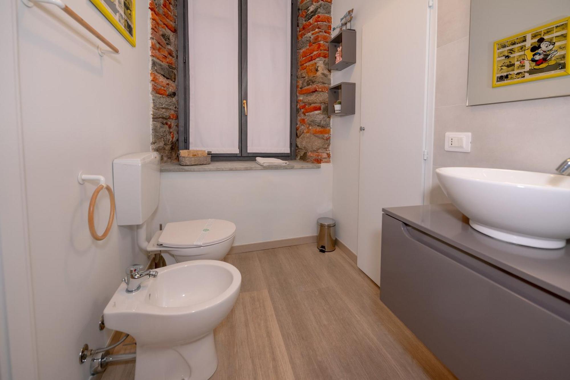 Baby Art Apartment Arona Esterno foto